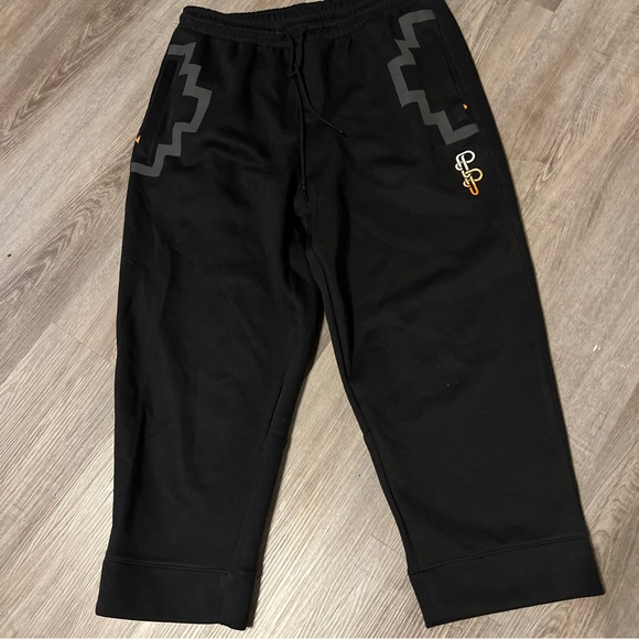 Puma X Pronounce Logo Cropped L Trousers Men Casual Comfort Technology Black K - Picture 1 of 10